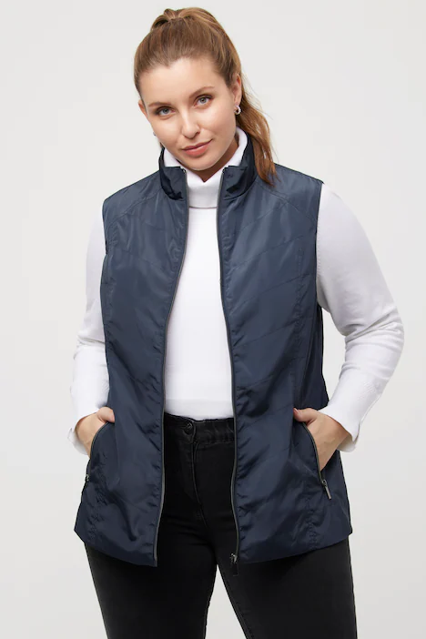 Gilet con collo alto, cuciture decorative e tasche con zip