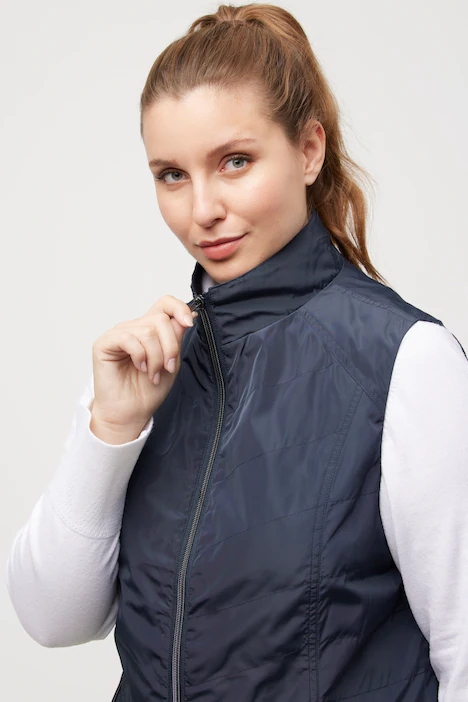 Gilet con collo alto, cuciture decorative e tasche con zip