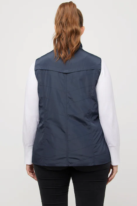 Gilet con collo alto, cuciture decorative e tasche con zip